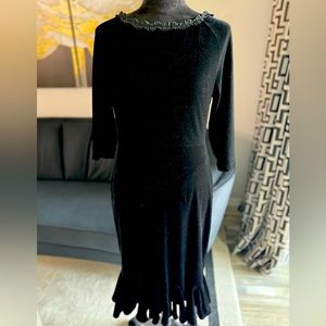 Black velvet mermaid midi flounce flutter dress. Polyester and spandex. Size 6